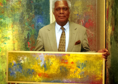 Winston with his paintings in Carmel Magazine. CA. 2008