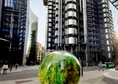 One World Reimagined, globe painted by Winston Branch installed in London, UK, 2022